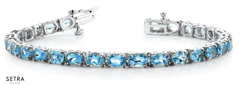 Oval Cut Natural Blue Topaz Women's Bridal Fancy Solid Bracelet In 14k Gold