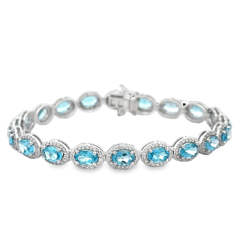 Blue Topaz and Diamond Bracelet in White Gold